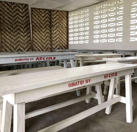 Benches and desks donated at government schools